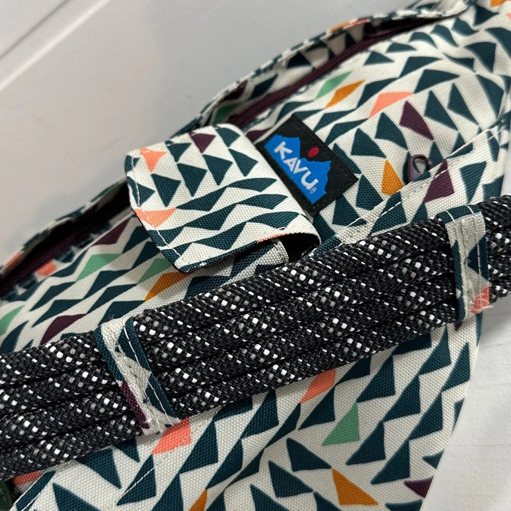 Kavu Geometric Triangle Sling Backpack in Cream, Black, Orange, Green, Navy